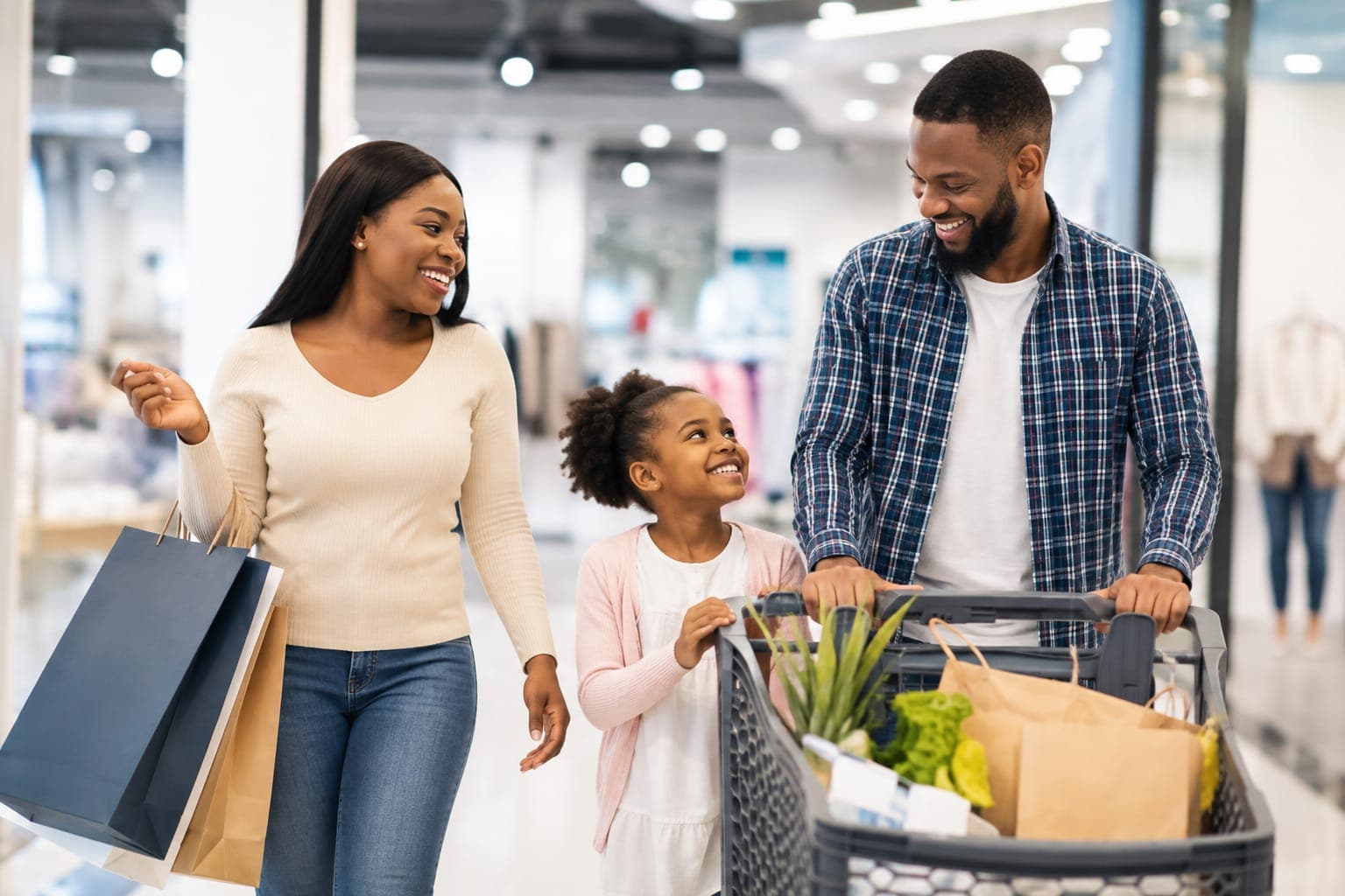 A family shopping, made possible by EmpowerCap funding